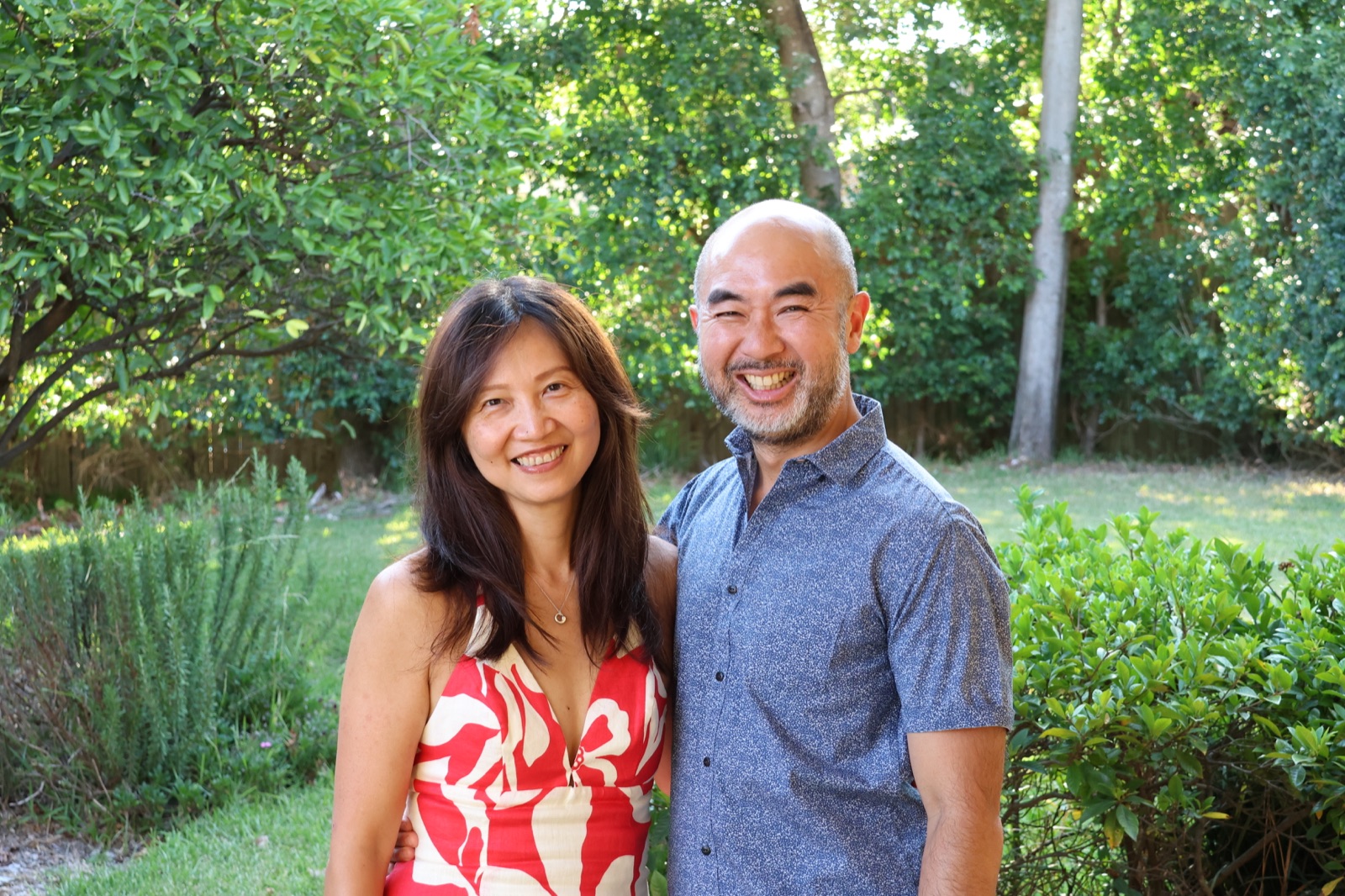 Michael and his wife smiling together outdoors